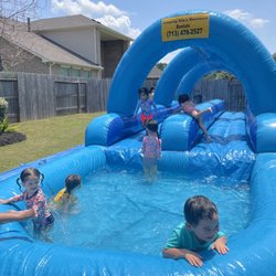 Jumping Stars Moonwalk Rentals - So much fun on the slip n slide!