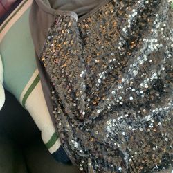 Damaged sequin tank the Goodwill employee damaged when he shoved all my clothes in the bag with no care for the items