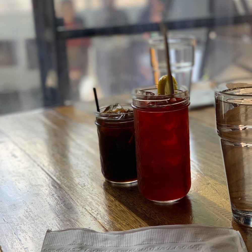Bunna Cafe - two glasses of iced tea and a napkin on a table - Ethiopian Near Me - Brooklyn, New York Bunna Cafe - two glasses of iced tea and a napkin on a table - Ethiopian Near Me - Brooklyn, New York