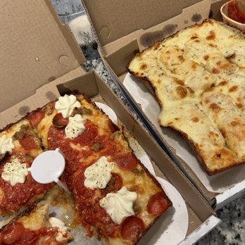 Blue Pan Pizza - Brooklyn bridge specialty pizza // breadsticks - Pizza Near Me - Denver, Colorado