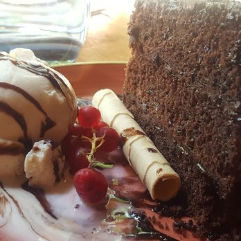 Taverna del Bisbe - Homemade chocolate cake with homemade ice cream - Catalan Near Me - Barcelona, B Taverna del Bisbe - Homemade chocolate cake with homemade ice cream - Catalan Near Me - Barcelona, B