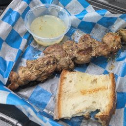 Pork kebob, came with lemon juice and a slice of grilled bread Pork kebob, came with lemon juice and a slice of grilled bread