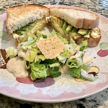 Cafe Lola - Egg & Olive Sandwich with side Caesar Salad - Cafes Near Me - Henderson, Nevada Cafe Lola - Egg & Olive Sandwich with side Caesar Salad - Cafes Near Me - Henderson, Nevada