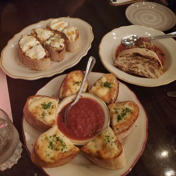Maialina - Clockwise from top: bruschetta ricotta, meatballs, garlic cheese bread - Italian Near Me - Indianapolis, Indiana