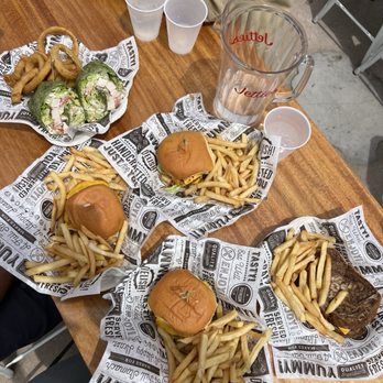 Jetties Waterfront Kitchen + Drink - Classic Smash Burgers, 4x4 Burger and Caesar Chicken Salad in Spinach Wrap. - New American Near Me - Lake Arrowhead, California