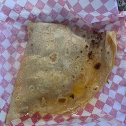 1/2 of a pretty greasy Pollo Asada Quesadilla