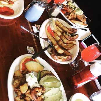 Oakland Grill - Crab cake benedict with Avocado hollandaise on side French Toast Plate Mimosas - Breakfast & Brunch Near Me - Oakland, California Oakland Grill - Crab cake benedict with Avocado hollandaise on side French Toast Plate Mimosas - Breakfast & Brunch Near Me - Oakland, California