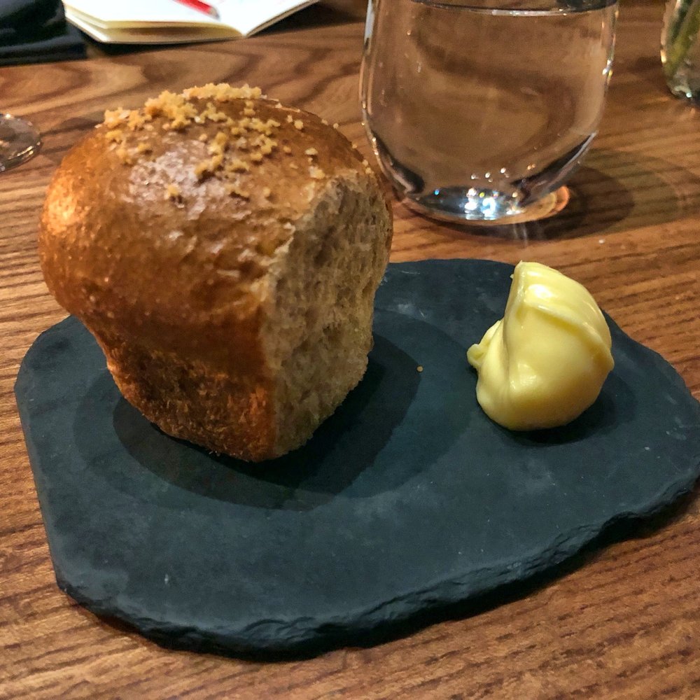 Lazy Bear - House made rolls with cultured butter - New American Near Me - San Francisco, California Lazy Bear - House made rolls with cultured butter - New American Near Me - San Francisco, California