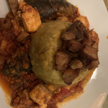 Sofrito Restaurant & Bar - Seafood Mofongo Fish, Shrimp, mussels in tomato based sauce - Latin American Near Me - Greenville, South Carolina