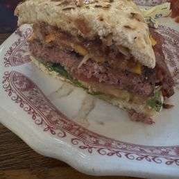 Half of a diet Chin burger in homemade roll
