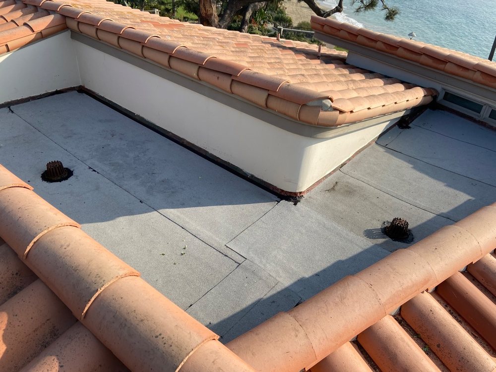 Slide of Green Leaf Roofers