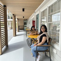 Boarding House - Outside each room had a patio table & a pair of chairs