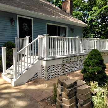 R L Construction - a front porch with steps and railings - Roofing Near Me - New Britain, Connecticut R L Construction - a front porch with steps and railings - Roofing Near Me - New Britain, Connecticut