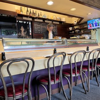 Tanuki Restaurant - a bar with purple chairs - Sushi Bars Near Me - San Francisco, California Tanuki Restaurant - a bar with purple chairs - Sushi Bars Near Me - San Francisco, California