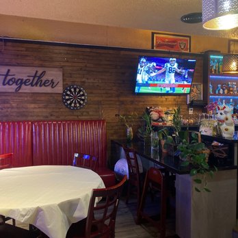A One Kitchen & Bar - Entrance and bar area and another tv. - Bars Near Me - San Bruno, California A One Kitchen & Bar - Entrance and bar area and another tv. - Bars Near Me - San Bruno, California