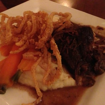 River Grille - Braised Short Ribs over Mash Potato with Glazed Carrots & onion straws - New American Near Me - Easton, Pennsylvania River Grille - Braised Short Ribs over Mash Potato with Glazed Carrots & onion straws - New American Near Me - Easton, Pennsylvania