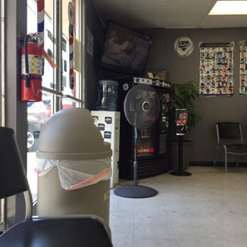 All Star Barber Shop - Nice Flatscreen TV. There's a fridge with drinks for sale in there. - Barbers Near Me - Escondido, California