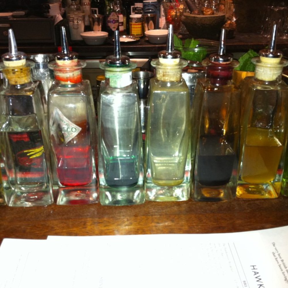 Hawksmoor Spitalfields - Line-up of cocktail infusions - Steakhouses Near Me - London, XGL Hawksmoor Spitalfields - Line-up of cocktail infusions - Steakhouses Near Me - London, XGL