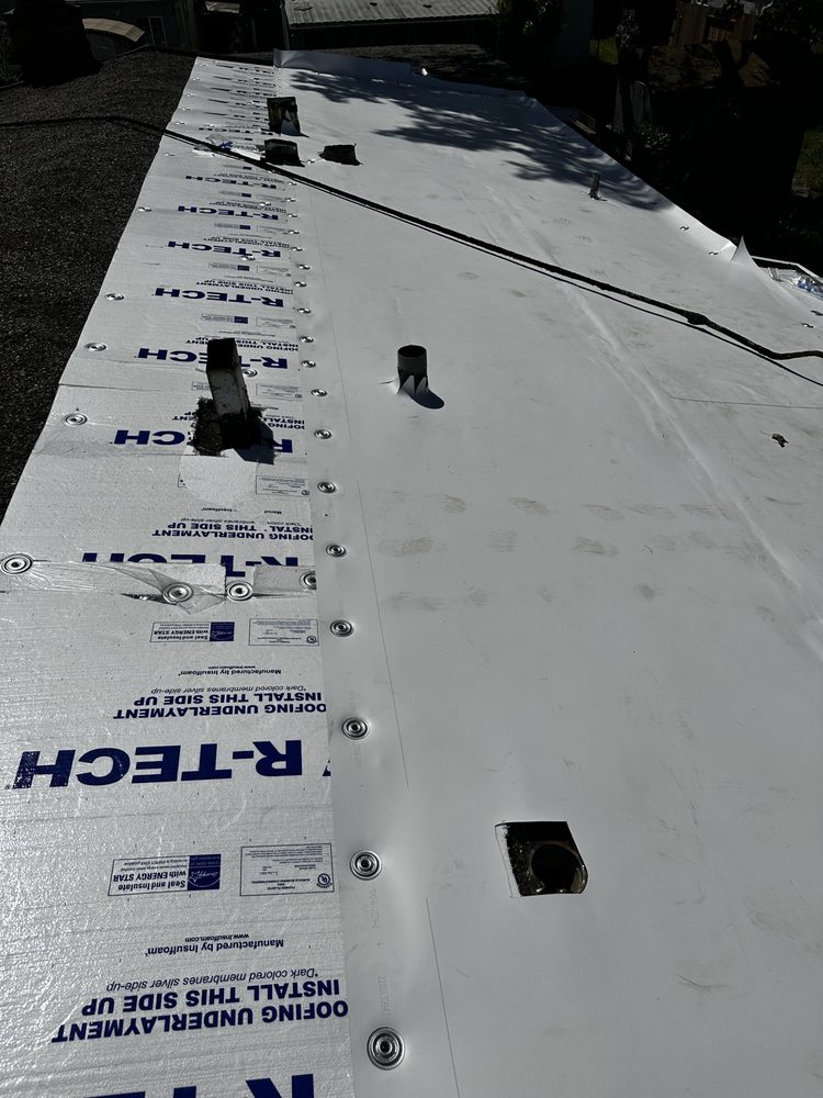 Slide of McMillan Roofing