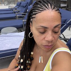 Hope's Braiding - Corn rows with individual Senegalese twists.