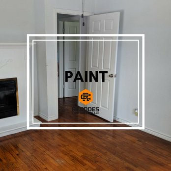 Recodes Contractors - a living room with a fireplace and door - General Contractors Near Me - Sugar Land, Texas