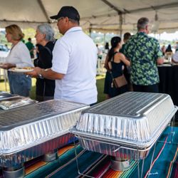 Baja Fish Taco & Burgers - On-site taco bar catering for a large outdoor event in San Diego, serving fresh, hot food to guests.