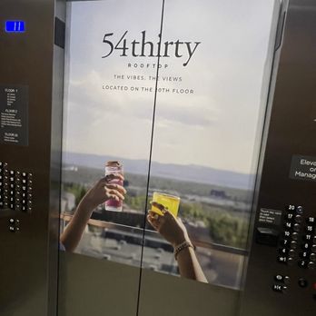 AC Hotel by Marriott Denver Downtown - Advert in elevator for top floor bar - Hotels Near Me - Denver, Colorado AC Hotel by Marriott Denver Downtown - Advert in elevator for top floor bar - Hotels Near Me - Denver, Colorado