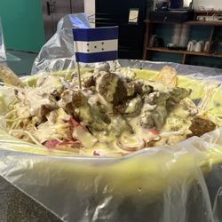 Sabores Del Puerto - Carne asada con tajadas