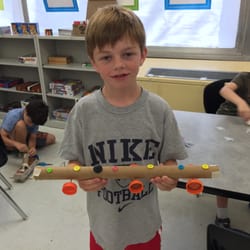 Neuron Garage - This camper's goal was to make the car with the most wheels and he's proud of his final product.