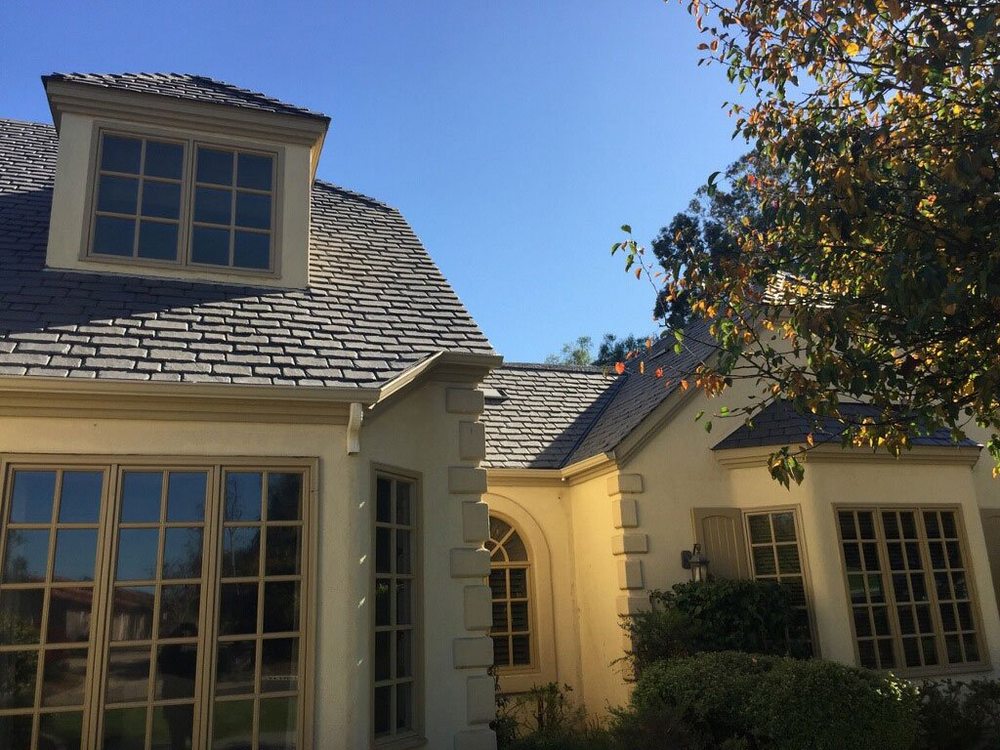 Slide of ECR Roofing & Solar