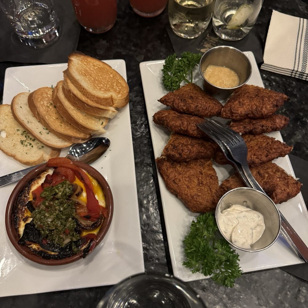 Chicago Magic Lounge - Potato pancakes and roasted peppers and garlic with Brie cheese and toast - Magicians Near Me - Chicago, Illinois Chicago Magic Lounge - Potato pancakes and roasted peppers and garlic with Brie cheese and toast - Magicians Near Me - Chicago, Illinois