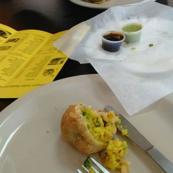 Sangam Indian Restaurant - A (rapidly disappearing) samosa! Great veggie app! - Indian Near Me - Denton, Texas Sangam Indian Restaurant - A (rapidly disappearing) samosa! Great veggie app! - Indian Near Me - Denton, Texas