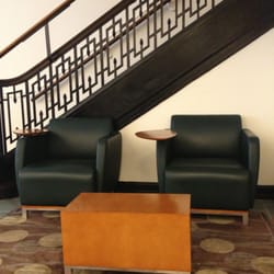 New York Public Library - Columbus Library - Cushioned chairs with laptop tables in the lobby