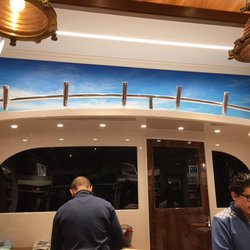 Vineyard Vines - checkout area with schooner look
