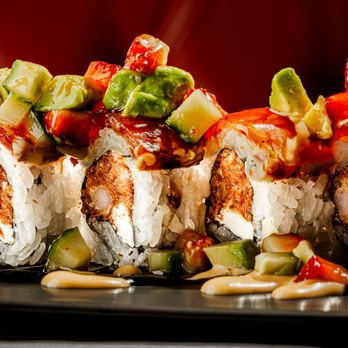 Rock N Roll Sushi - ponzu and eel sauces and finished with a sprinkle of sesame seeds. A rare treat. - Sushi Bars Near Me - Glendale, Arizona Rock N Roll Sushi - ponzu and eel sauces and finished with a sprinkle of sesame seeds. A rare treat. - Sushi Bars Near Me - Glendale, Arizona
