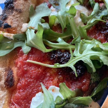 Rocket Pie - Feature pizza - anchovy, 'nduja and burrata (all Italian) and arugula. Comes with chilli oil for crust - Pizza Near Me - Canmore, Alberta Rocket Pie - Feature pizza - anchovy, 'nduja and burrata (all Italian) and arugula. Comes with chilli oil for crust - Pizza Near Me - Canmore, Alberta