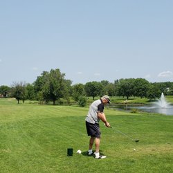 Boughton Ridge Golf Course - Teeing off on Hole #9, heading back towards the clubhouse. The pond & fountain (photo right) were nice