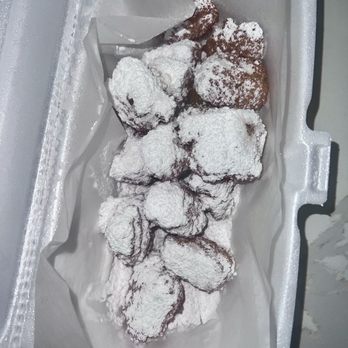 Winstead Smoke Co. - Corn nuggets with powdered sugar - Barbeque Near Me Winstead Smoke Co. - Corn nuggets with powdered sugar - Barbeque Near Me
