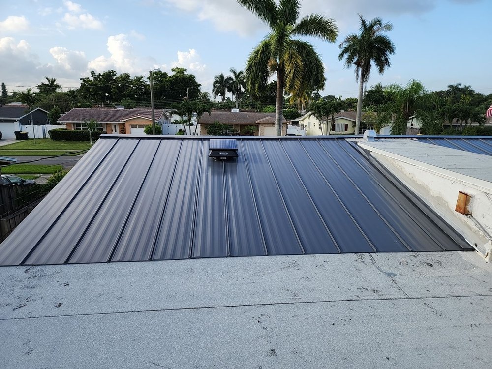 Slide of Dream Team Roofing