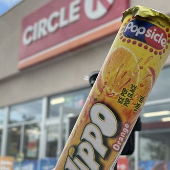 Circle K - a person holding up a can of chips - Convenience Stores Near Me - Markham, Ontario Circle K - a person holding up a can of chips - Convenience Stores Near Me - Markham, Ontario