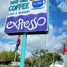 a sign for a coffee shop