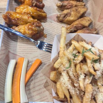 Wing Bros - Garlic fries , chipotle rub, mango habanero - Chicken Wings Near Me - Brentwood, California Wing Bros - Garlic fries , chipotle rub, mango habanero - Chicken Wings Near Me - Brentwood, California