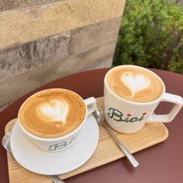 All spice cappuccino and vanilla latte