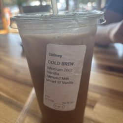 Un Cafecito - Medium cold brew with almond milk and sugar free vanilla syrup