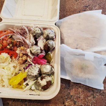 Falafelle - a plastic container filled with meat and vegetables - Vegan Near Me - Belmont, California Falafelle - a plastic container filled with meat and vegetables - Vegan Near Me - Belmont, California