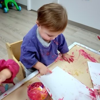 Chappell Schools - 1yr old class finger painting - Elementary Schools Near Me - Jacksonville, Florida