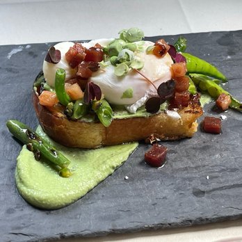 North Pond - Pea, Toast Sweet Pea Purée, Poached Egg**, Charred Sugar Snap Peas & Green Beans, Bacon-Maple Vinaigrette - New American Near Me - Chicago, Illinois