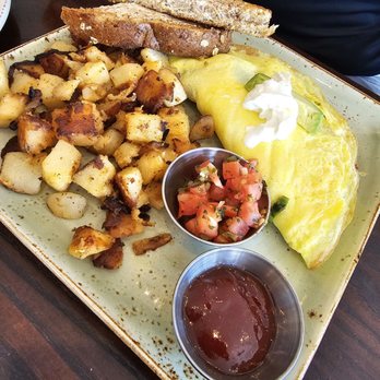 First Watch - Bacado omelet with potatoes - Breakfast & Brunch Near Me - Bellevue, Nebraska First Watch - Bacado omelet with potatoes - Breakfast & Brunch Near Me - Bellevue, Nebraska