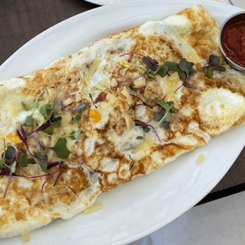 Anonymous Cafe - 4 egg omelette with the works (e.g., ham, sausage, feta, spinach, tomato, herbs, etc.) - Coffee & Tea Near Me - Houston, Texas Anonymous Cafe - 4 egg omelette with the works (e.g., ham, sausage, feta, spinach, tomato, herbs, etc.) - Coffee & Tea Near Me - Houston, Texas