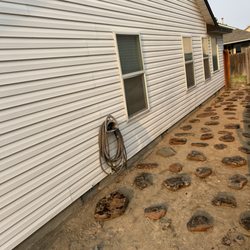 Miggos Summer Lawns LLC - Laying rock